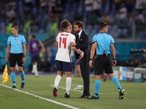 Leeds United's Kalvin Phillips is greeted by England manager Gareth Southgate. Pic: Getty
