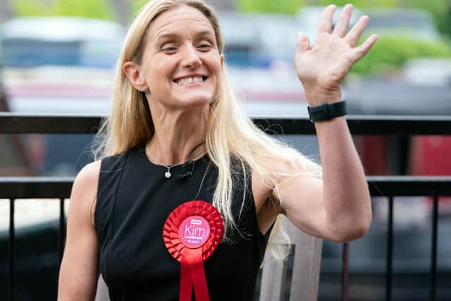 Labour candidate Kim Leadbeater celebrates by a canal in Huddersfield after winning the Batley and Spen by-election. (Danny Lawson/PA)