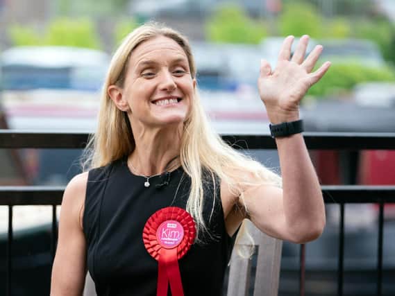 Labour candidate Kim Leadbeater celebrates by a canal in Huddersfield after winning the Batley and Spen by-election. (Danny Lawson/PA)