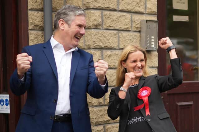 Labour leader Sir Keir Starmer celebrates with Kim Leadbeater after her victory in the Batley and Spen by-election
