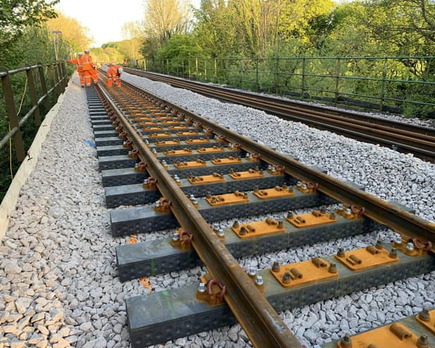 Library image of new sleepers being installed on Britain's mainline railway