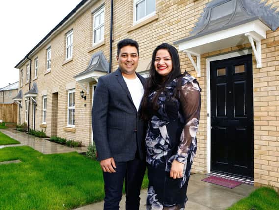 Redrow customers Sachin and Swathi outside their home.