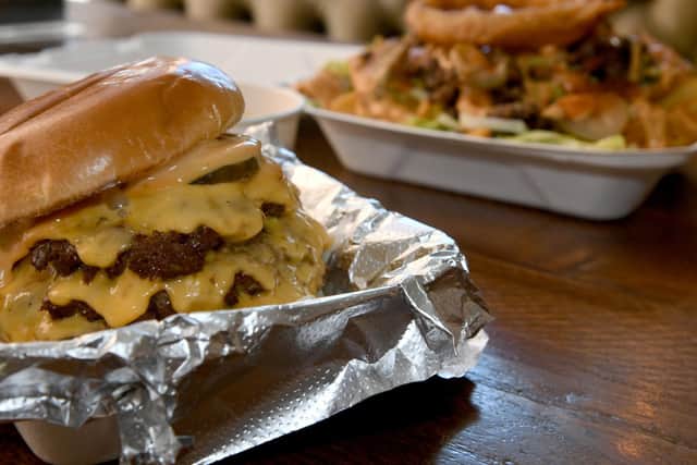 'The Big' burger at Big Buns. A triple patty dry aged smash patty. Photo: Gary Longbottom