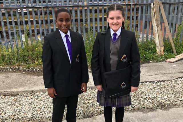 Trinity Academy Leeds said they were aware of the "financial hardships" caused by Covid in East Leeds.
Two students on a recent visit.