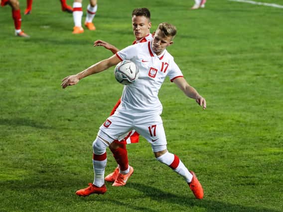 Leeds United midfielder Mateusz Bogusz in action for Poland. Pic: Getty