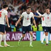 Harry Maguire, John Stones, and Kalvin Phillips of England celebrate following their team's victory in the UEFA Euro 2020 Championship Semi-final match between England and Denmark at Wembley Stadium (Picture: Andy Rain - Pool/Getty Images)