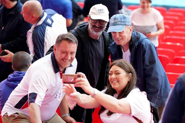 Frank Skinner and David Baddiel pose for pictures in the stands with other fans during the UEFA Euro 2020 semi final match at Wembley (Photo: PA Wire/Mike Egerton)