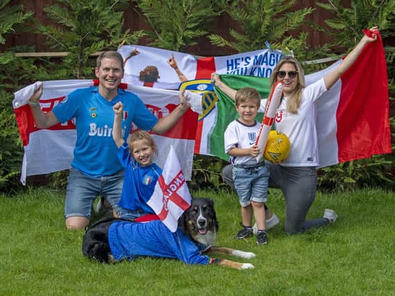 Avid football fans Daniel Furniss, Italian wife Carlotta, and their children Francesca and Federico, are torn between who they want to win in the Euro 2020 final at Wembley. Picture Tony Johnson