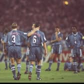 Stuart Pearce (left) consoles team-mate Gareth Southgate after his penalty miss during the Euro 96 semi-final (Picture: Ross Kinnaird/Allsport UK)