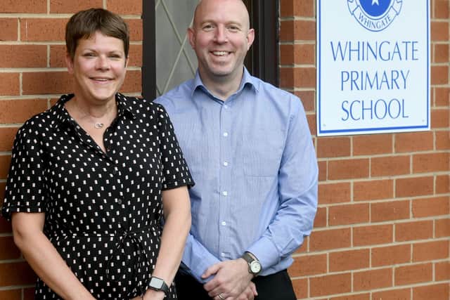 Karen Loney, co-head teacher at Whingate Primary School, with teacher Andy Rhodes.