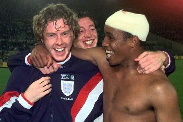 EPIC: Paul Ince celebrates with Steve McManaman after England qualify for the World Cup, in Rome, against Italy in October 1997. Picture: Adam Butler/PA Wire.