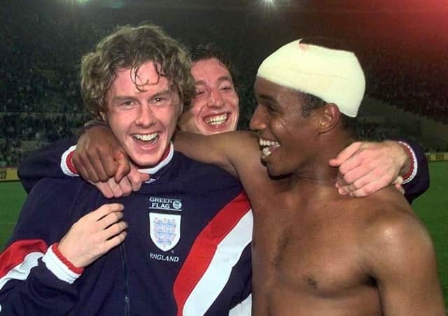 EPIC: Paul Ince celebrates with Steve McManaman after England qualify for the World Cup, in Rome, against Italy in October 1997. Picture: Adam Butler/PA Wire.