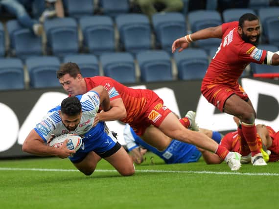 Rhyse Martin scores against Catalans. Picture by Jonathan Gawthorpe.