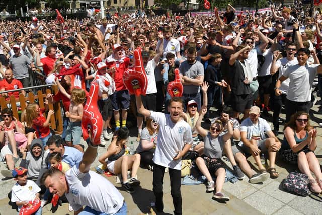 England fans watching the 2018 World Cup on the Millennium Square screen (photo: PA).