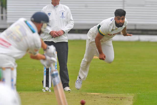 Wrenthorpe bowler Al-Mustafa Rafique on the attack against Pudsey St Lawrence. Picture: Steve Riding.