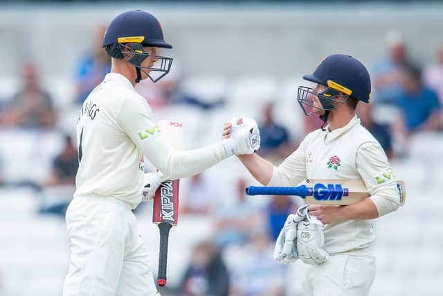 WELL DONE:  Lancashire's Keaton Jennings (l) celebrates his half century against Yorkshire with Alex Davies. Picture by Allan McKenzie/SWpix.com