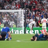 WEMBLEY PAIN - England were beaten on penalties by Italy at Wembley in the Euro 2020 final. Leeds United's Kalvin Phillips consoled Bukayo Saka of Arsenal who missed from the spot. Pic: Getty