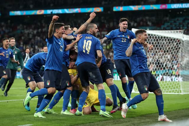 Italy players celebrate winning the penalty shoot-out at Wembley. Picture: Nick Potts/PA