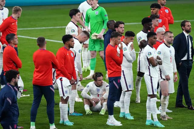 A dejected England side after losing a penalty shoot-out to Italy in the final of Euro 2020.