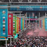 Fans gather outside of Wembley stadium ahead of England v Italy. Pic: Getty