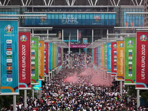 Fans gather outside of Wembley stadium ahead of England v Italy. Pic: Getty