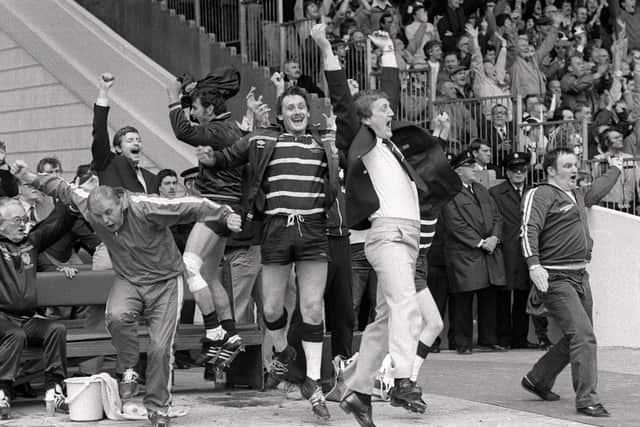 Featherstone Rovers' bench jumps for joy at the Challenge Cup final in 1983.