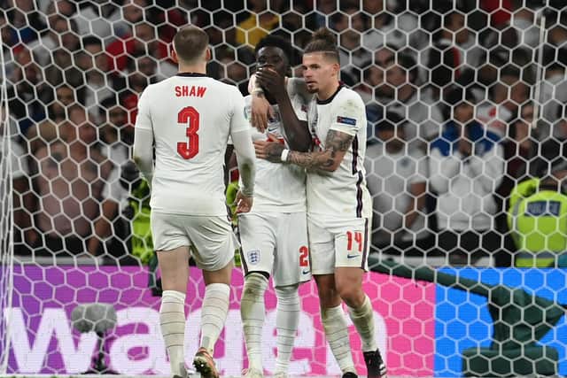 England's Kalvin Phillips comforts Bukayo Saka following his penalty miss at Wembley. Pic: Getty