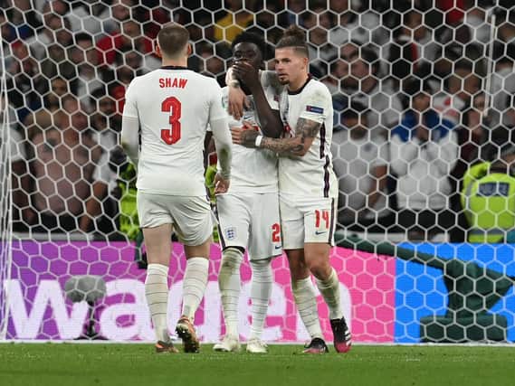 England's Kalvin Phillips comforts Bukayo Saka following his penalty miss at Wembley. Pic: Getty