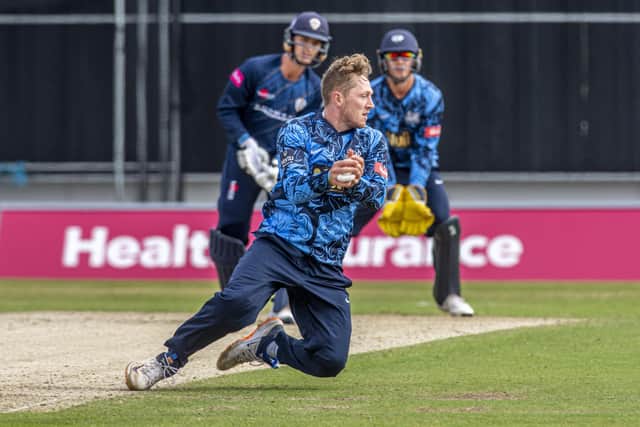 SPINNING AROUND: Yorkshire's Dom Bess brilliantly catches Derbyshire's Leus Du Plooy from his own bowling Picture: Tony Johnson