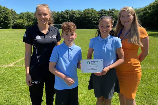 Left-to-right: Charlotte Ellis (PE and School Sport Officer, Yorkshire Sport Foundation), Lewis, Ava, Courtenay Cowperthwaite (Assistant Headteacher and PE Lead, Thorpe Primary School).