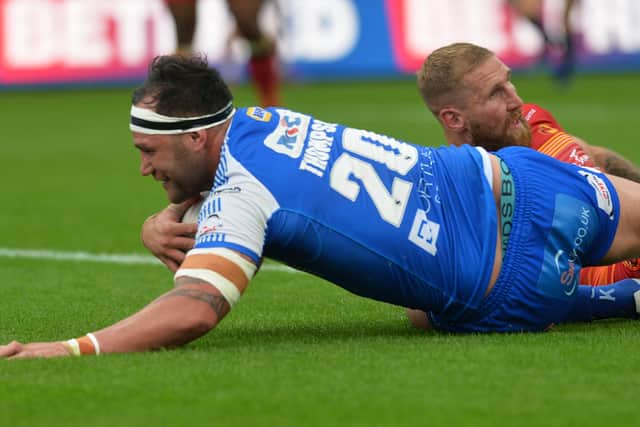 Bodene Thompson scores against Catalans. He will miss the trip to France on Friday after picking up a suspension.
Picture: Jonathan Gawthorpe.
