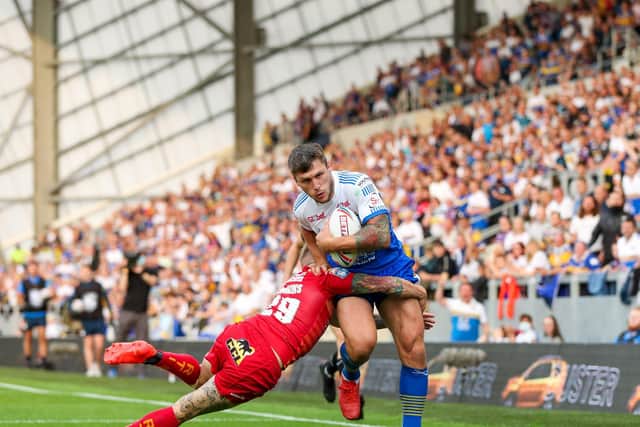 Leeds Rhinos' Tom Briscoe in action against Catalans Dragons earlier this month - with crowds back in Emerald Headingley. (Alex Whitehead/SWpix.com)