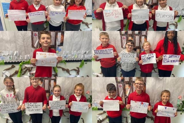 The year four pupils Willow at Grimes Dyke Prmary School, Swarcliffe, with their messages of support to the England team.