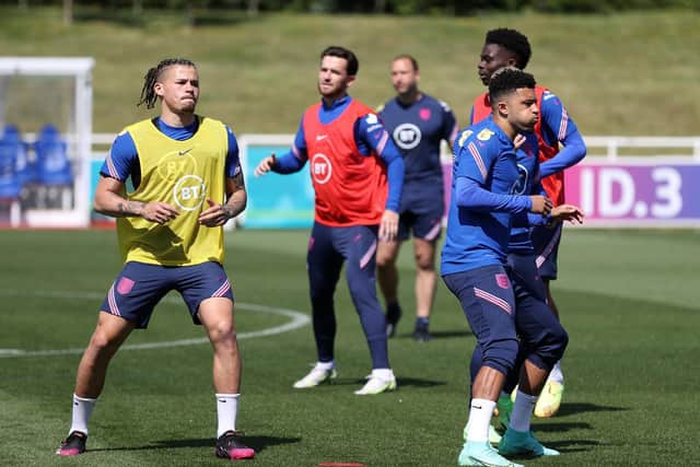 REUNITED? Leeds United's England international midfielder Kalvin Phillips, left, looks likely to face Three Lions team mate Jadon Sancho, right, in the season opener at Manchester United. Photo by Catherine Ivill/Getty Images.