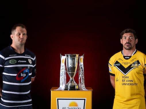 Rovers captain James Lockwood, left, and his York rival Chris Clarkson with the 1895 Cup. Picture by Allan McKenzie/SWpix.com.