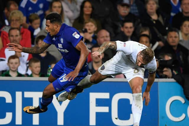 OFF: Leeds United captain Liam Cooper clatters Cardiff City's Nathaniel Mendez- Laing to earn a second yellow card and an early bath in the Championship clash of September 2017. Photo by Stu Forster/Getty Images.