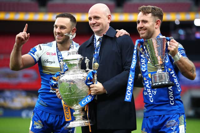 Luke Gale, Richard Agar and Richie Myler celebrate with the Challenge Cup trophy last year. Gale has urged his friend Paul McShane to enjoy the Wembley experience. Picture: Michael Steele/Getty Images.