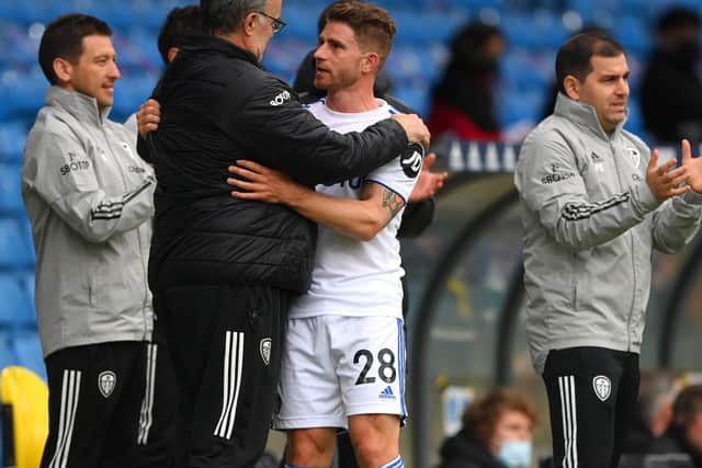 WINNING TEAM: Leeds United head coach Marcelo Bielsa, left, and outgoing former Whites defender Gaetano Berardi, right, share an embrace after Berardi's final game for Leeds against West Brom. Photo by Stu Forster/Getty Images.