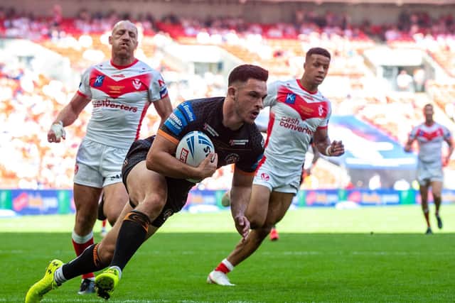 Niall Evalds crosses for Tigers' opening try. Picture by Bruce Rollinson.