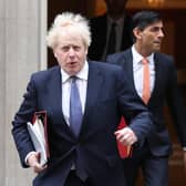 Soon Boris Johnson and Rishi Sunak were  forced to backtrack on their “trial” and confirm they would, in fact, self-isolate. Pic: Jonathan Brady/PA