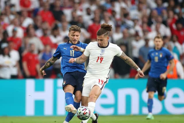 TACKLING THE BEST: Leeds United's England international midfielder Kalvin Phillips in the Euro 2020 final against Italy, pictured in combat with Ciro Immobile. Photo by Carl Recine - Pool/Getty Images.