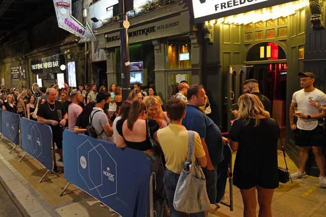 People queuing for the Viaduct Bar in Leeds, after the final legal coronavirus restrictions were lifted in England at midnight. PIC: PA