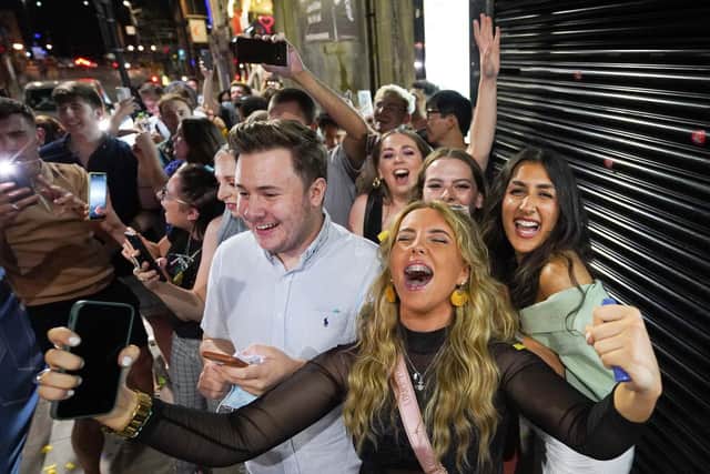 People queuing for Bar Fibre in Leeds city centre after the final legal coronavirus restrictions were lifted in England at midnight. PIC: PA