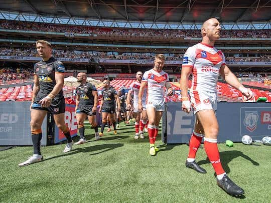 Tigers and Saunts walk out at Wembley. Picture by Bruce Rollinson.