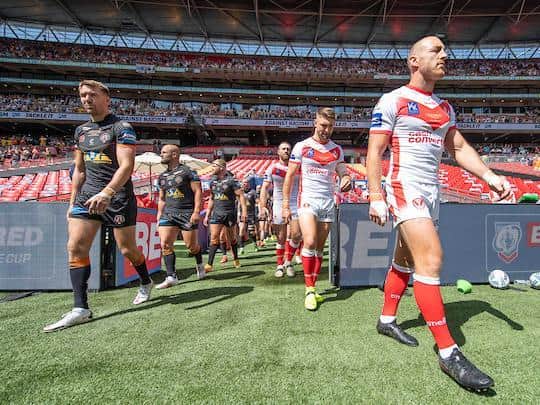 Michael Shenton, left and Saints' James Roby lead their teams out at Wembley. Picture by Allan McKenzie/SWpix.com.
