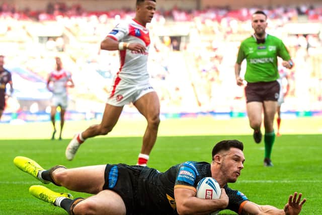 Niall Evalds touches down for Tigers' first try. Picture by Bruce Rollinson.