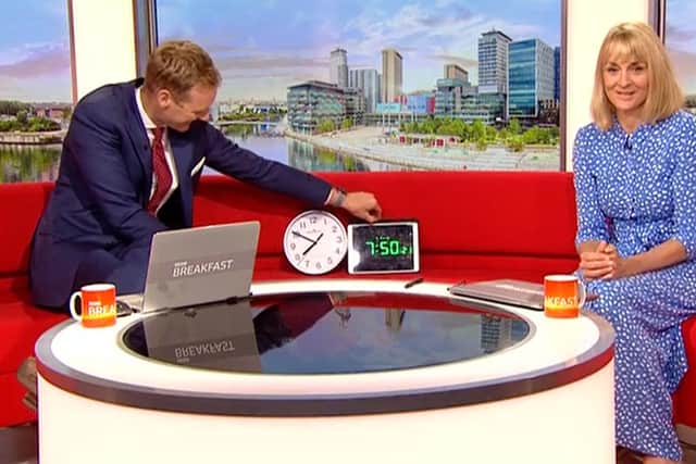 Framegrab from BBC Breakfast showing two clocks on the studio sofa between hosts Dan Walker and Louise Minchin after the on-screen clock broke down (photo: PA).