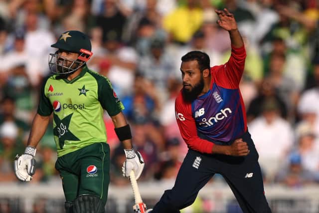 Super spell: Yorkshire's Adil Rashid took a career-best 4-35 to tee up England's victory at Old Trafford.  (Photo by Stu Forster/Getty Images)
