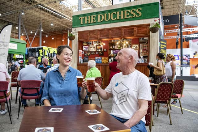 Artists Katie Etheridge & Simon Persighetti, made the 12ft x 12ft, four-sided and fully operational pop-up-pub in Leeds Market and sample a pint.