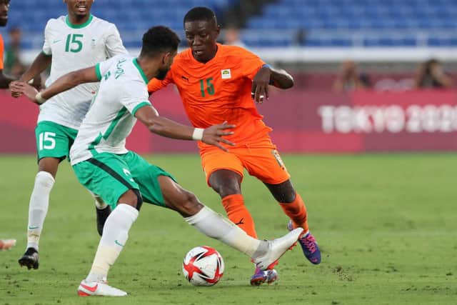 OLYMPIAN: Former Leeds United winger Max Gradel, on the ball in action for Ivory Coast in their Tokyo 2020 opener against Saudi Arabia. Photo by YOSHIKAZU TSUNO/AFP via Getty Images.
